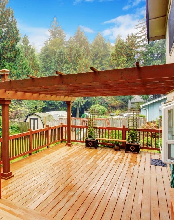 Nice wooden deck with woods in the background